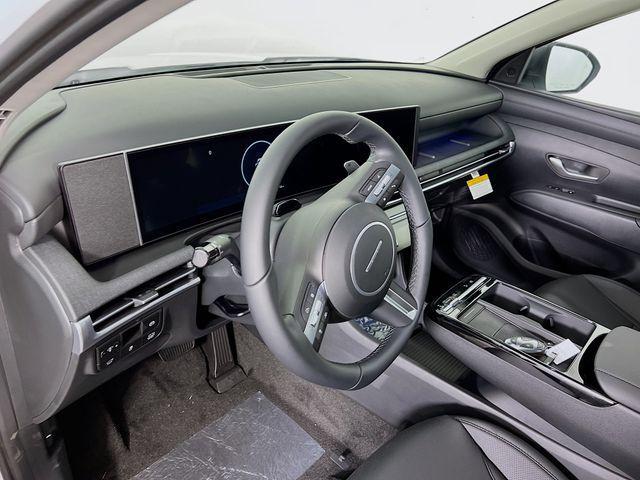 Photo of 2025 Creamy White Pearl Hyundai TUCSON Hybrid