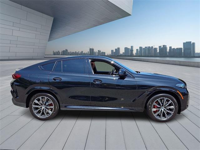 Photo of 2025 Black Sapphire Metallic BMW X6