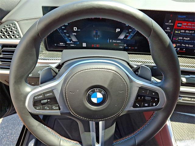 Photo of 2025 Black Sapphire Metallic BMW X6