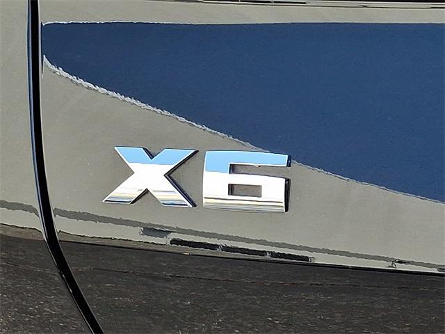 Photo of 2025 Black Sapphire Metallic BMW X6