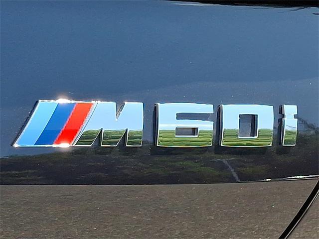 Photo of 2025 Black Sapphire Metallic BMW X6