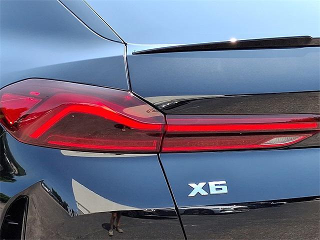 Photo of 2025 Black Sapphire Metallic BMW X6