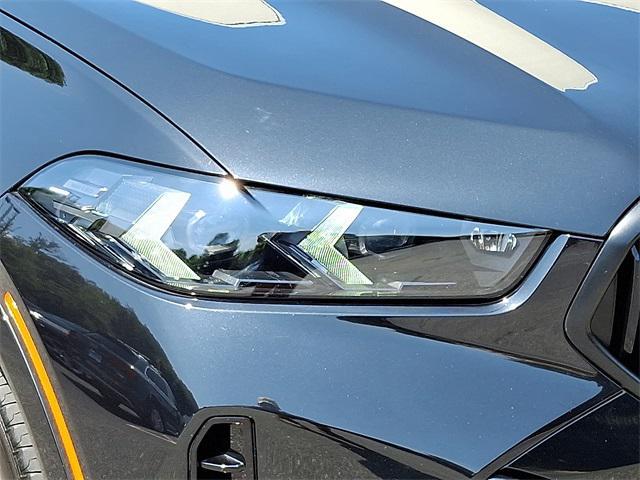 Photo of 2025 Black Sapphire Metallic BMW X6