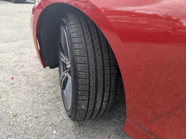 Photo of 2024 Melbourne Red Metallic BMW 330