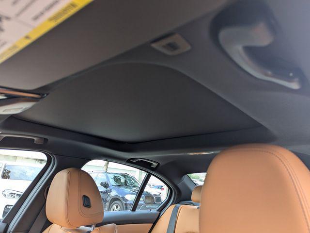 Photo of 2024 Melbourne Red Metallic BMW 330