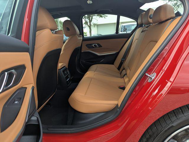 Photo of 2024 Melbourne Red Metallic BMW 330