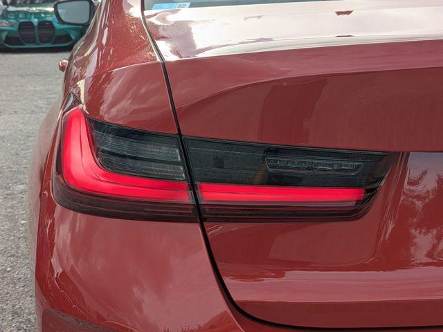 Photo of 2024 Melbourne Red Metallic BMW 330