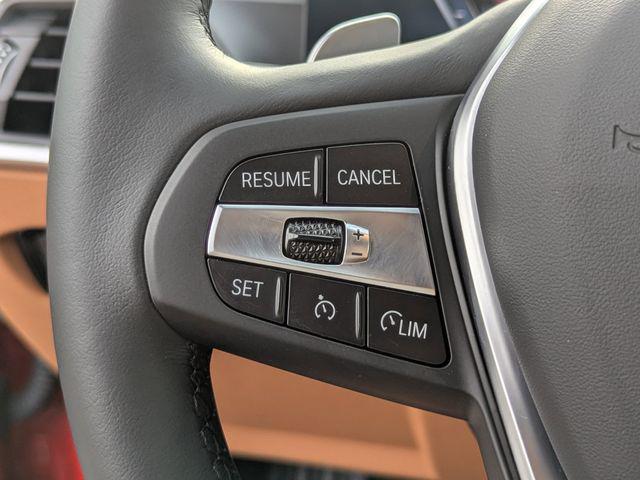 Photo of 2024 Melbourne Red Metallic BMW 330