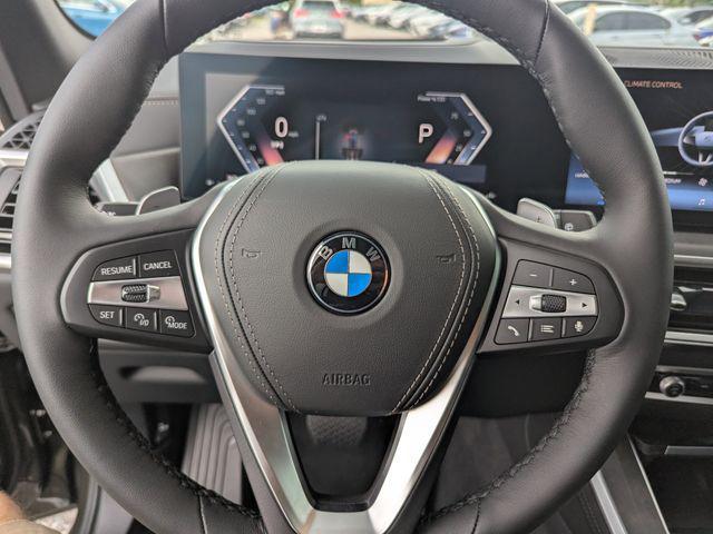 Photo of 2026 Green Metallic BMW X5
