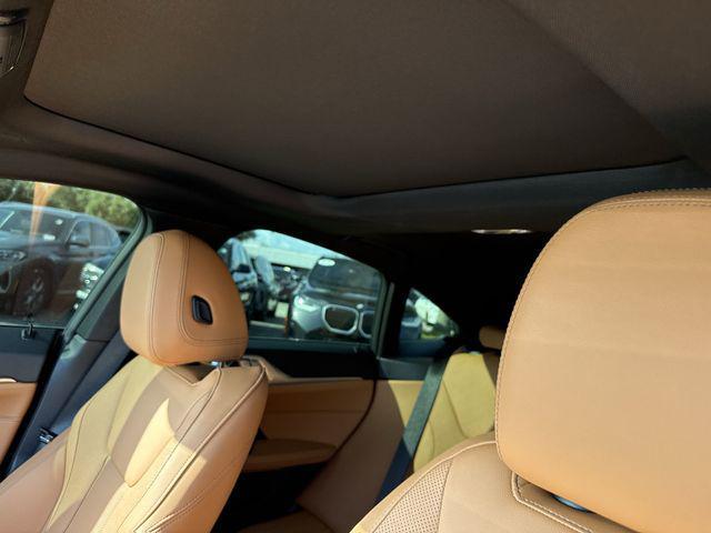 Photo of 2023 Black Sapphire Metallic BMW i4 Gran Coupe