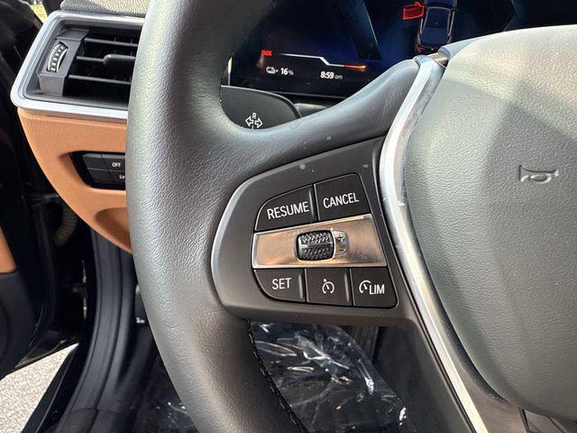 Photo of 2023 Black Sapphire Metallic BMW i4 Gran Coupe