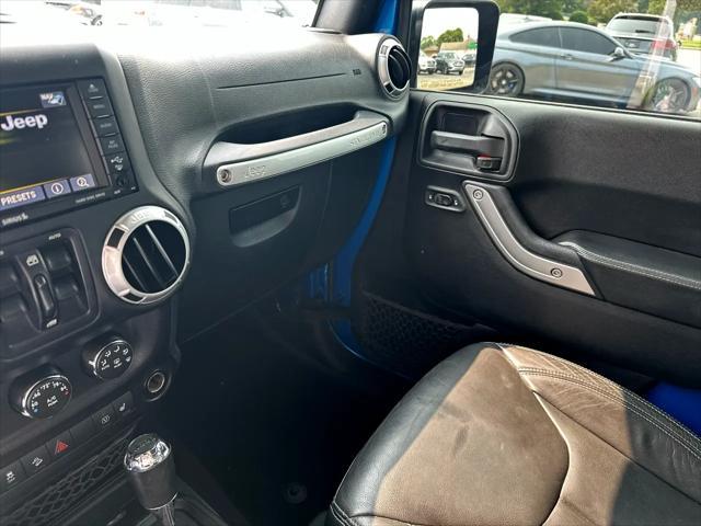 Photo of 2016 Blue Jeep Wrangler Unlimited