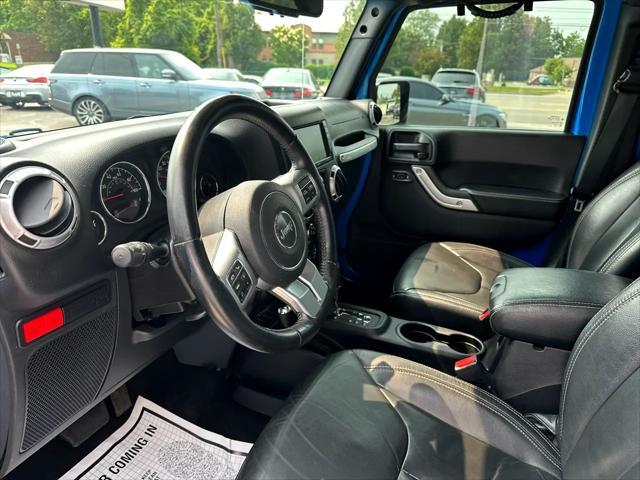 Photo of 2016 Blue Jeep Wrangler Unlimited