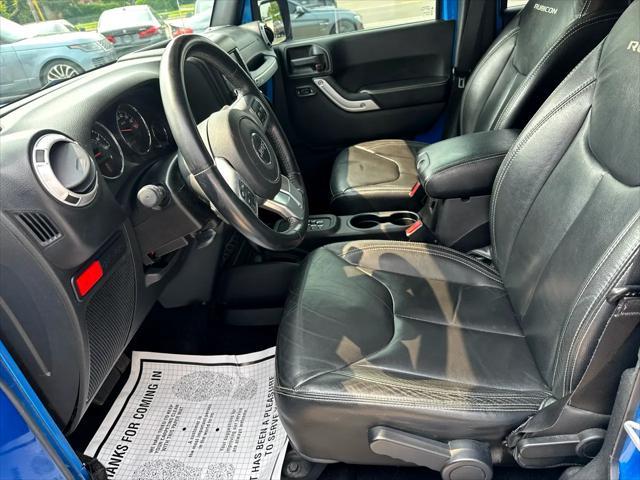 Photo of 2016 Blue Jeep Wrangler Unlimited