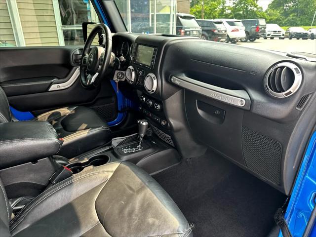 Photo of 2016 Blue Jeep Wrangler Unlimited