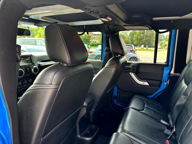 Photo of 2016 Blue Jeep Wrangler Unlimited