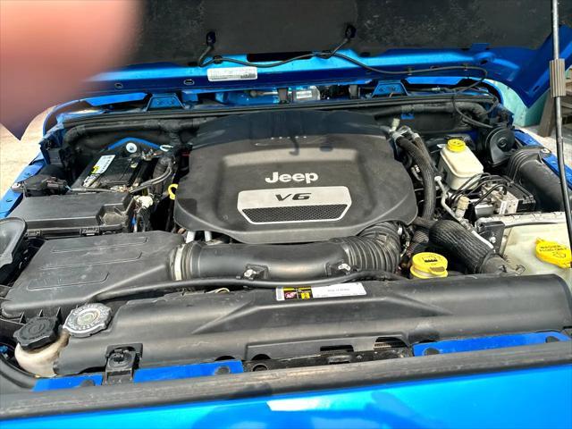 Photo of 2016 Blue Jeep Wrangler Unlimited