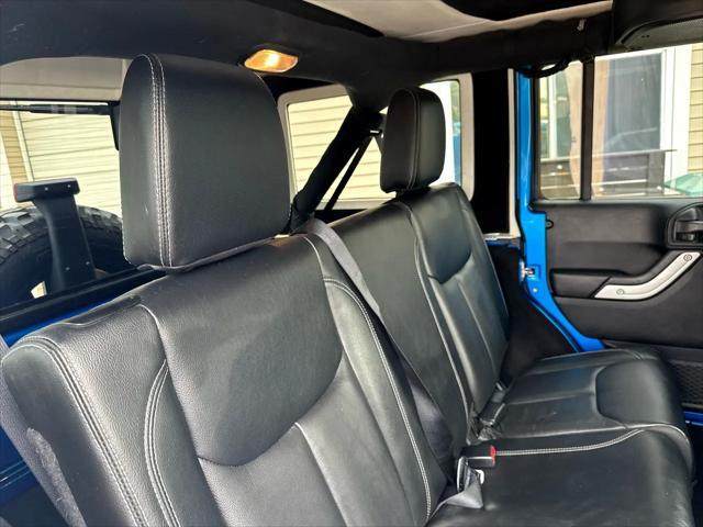 Photo of 2016 Blue Jeep Wrangler Unlimited