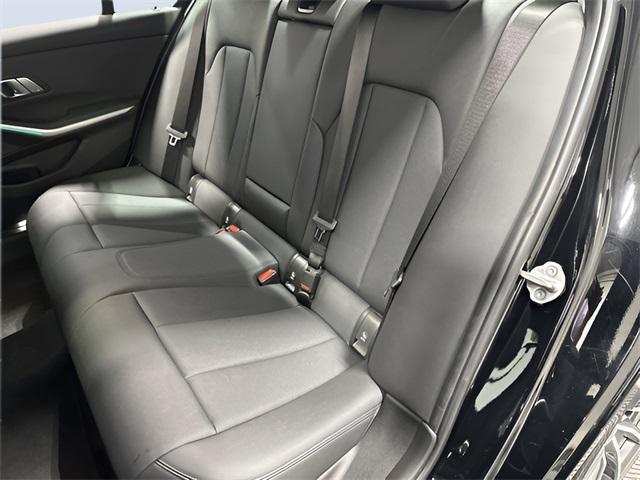 Photo of 2021 Jet Black BMW 330