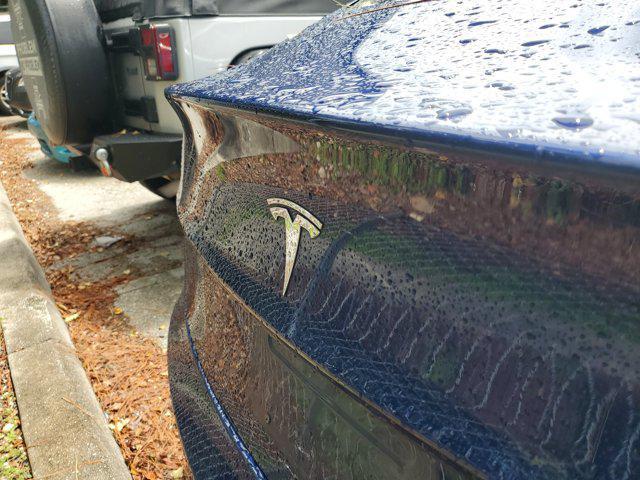 Photo of 2018 Deep Blue Metallic Tesla Model 3