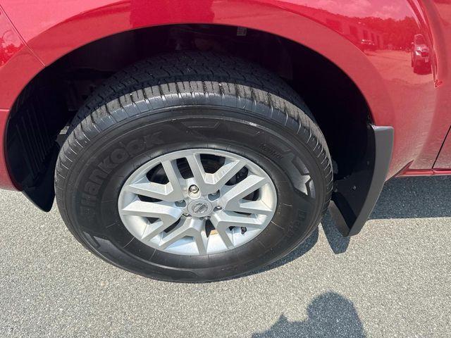 Photo of 2019 Cayenne Red Metallic Nissan Frontier