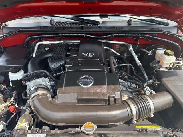 Photo of 2019 Cayenne Red Metallic Nissan Frontier