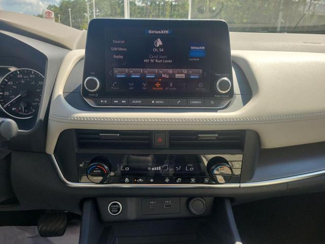 Photo of 2023 Scarlet Ember Tintcoat Nissan Rogue