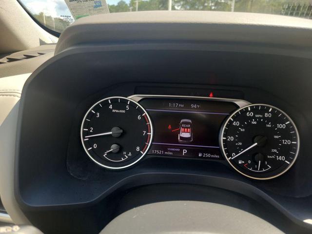 Photo of 2023 Scarlet Ember Tintcoat Nissan Rogue