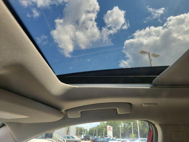 Photo of 2023 Scarlet Ember Tintcoat Nissan Rogue