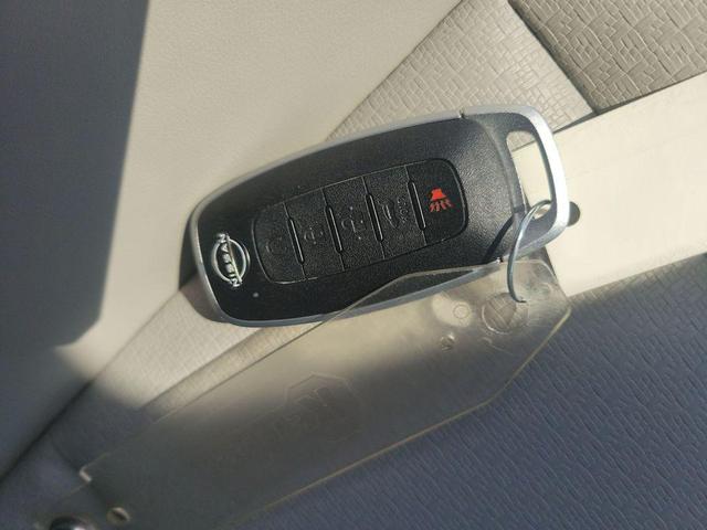 Photo of 2023 Scarlet Ember Tintcoat Nissan Rogue
