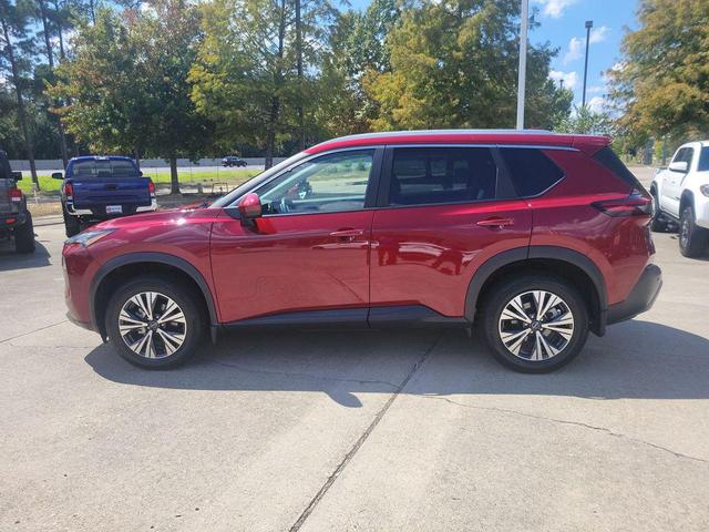 Photo of 2023 Scarlet Ember Tintcoat Nissan Rogue