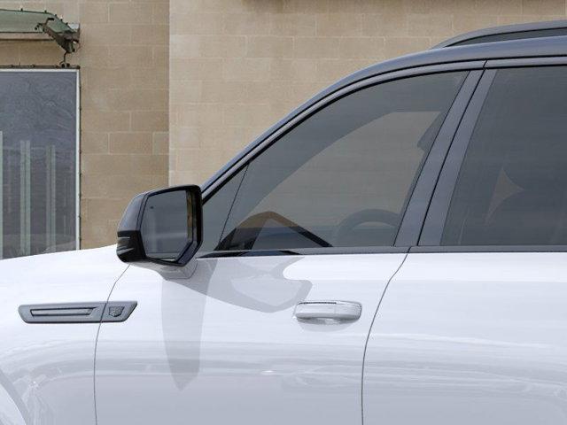 Photo of 2026 Vibrant White Tricoat Cadillac Escalade IQ
