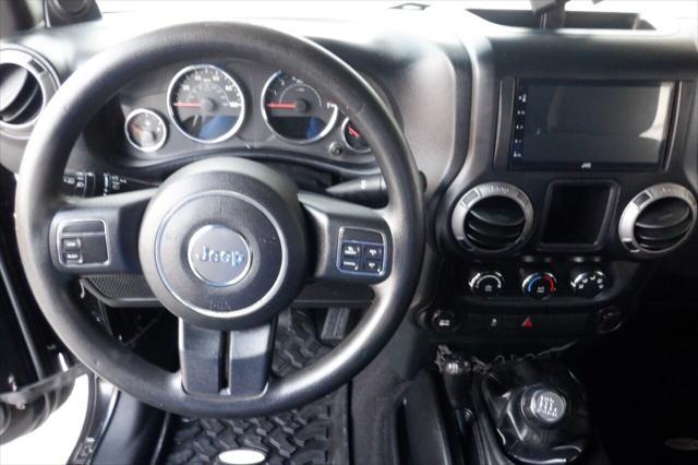 Photo of 2013 Black Clearcoat Jeep Wrangler Unlimited