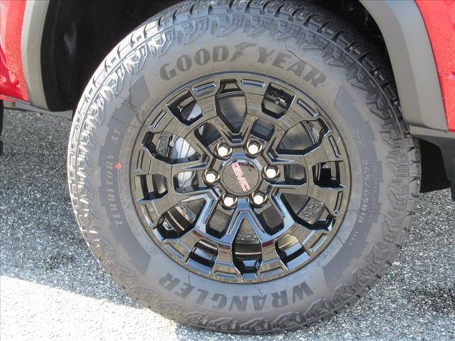 Photo of 2026 Volcanic Red Tintcoat GMC Canyon