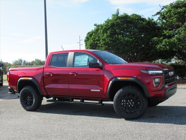 Photo of 2026 Volcanic Red Tintcoat GMC Canyon