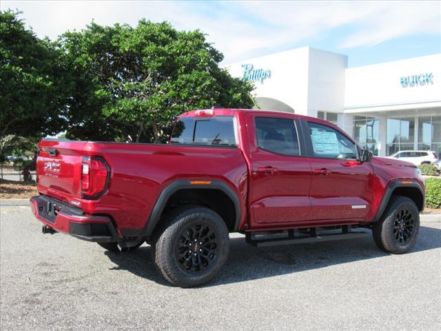 Photo of 2026 Volcanic Red Tintcoat GMC Canyon