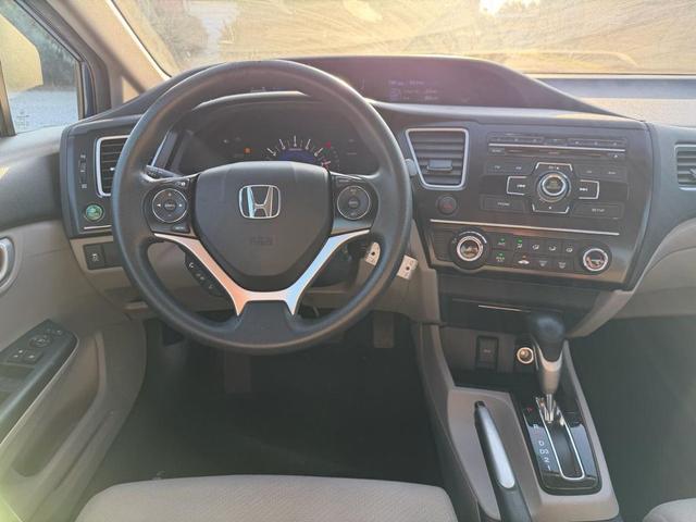 Photo of 2013 Dyno Blue Pearl Honda Civic