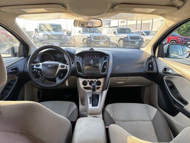 Photo of 2012 Ingot Silver Metallic Ford Focus