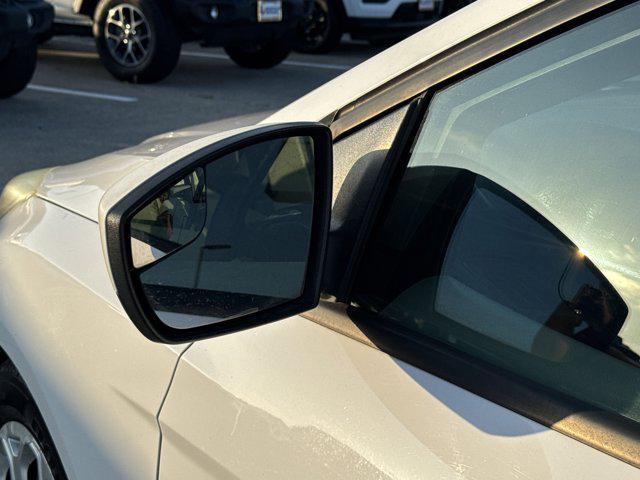 Photo of 2012 Ingot Silver Metallic Ford Focus