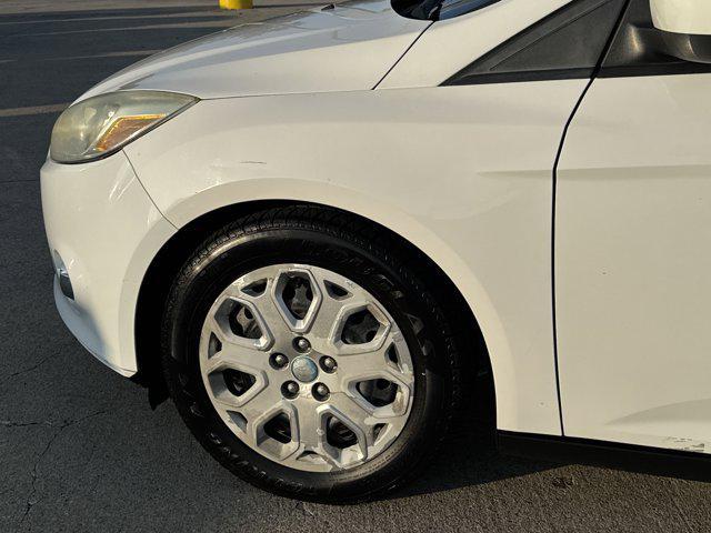 Photo of 2012 Ingot Silver Metallic Ford Focus