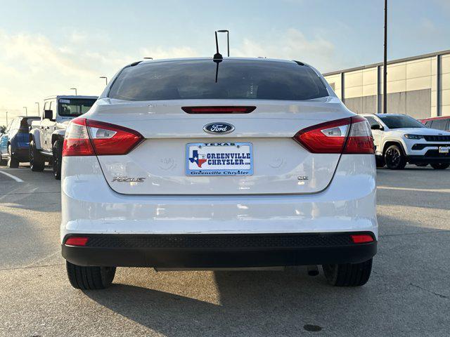 Photo of 2012 Ingot Silver Metallic Ford Focus