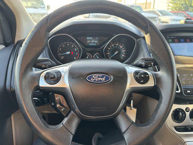 Photo of 2012 Ingot Silver Metallic Ford Focus