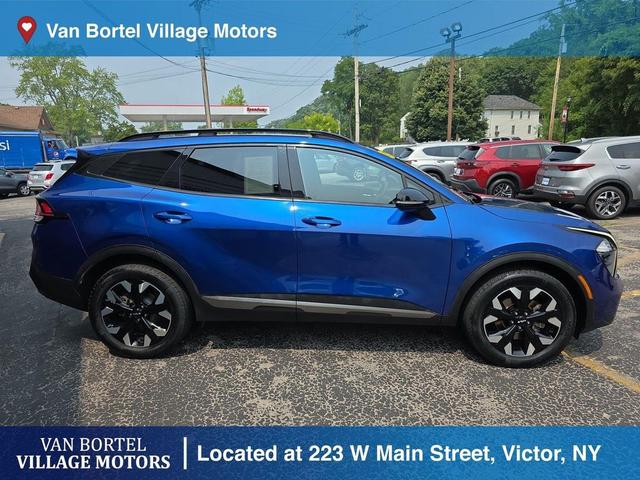 Photo of 2023 Sapphire Blue Kia Sportage