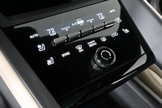 Photo of 2025 Jet Black Metallic Porsche Macan