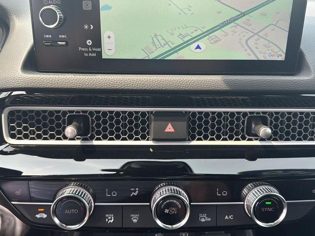 Photo of 2026 Crystal Black Pearl Honda Civic Hybrid