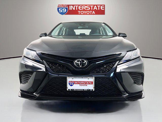 Photo of 2024 Midnight Black Metallic Toyota Camry
