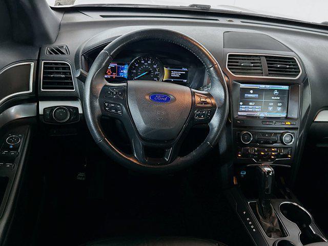 Photo of 2016 Ruby Red Metallic Tinted Clearcoat Ford Explorer