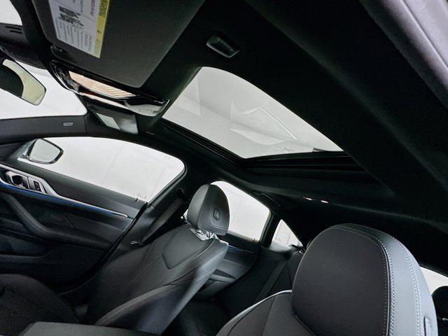 Photo of 2025 Skyscraper Grey Metallic BMW i4 Gran Coupe