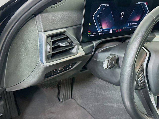 Photo of 2024 Jet Black BMW 330