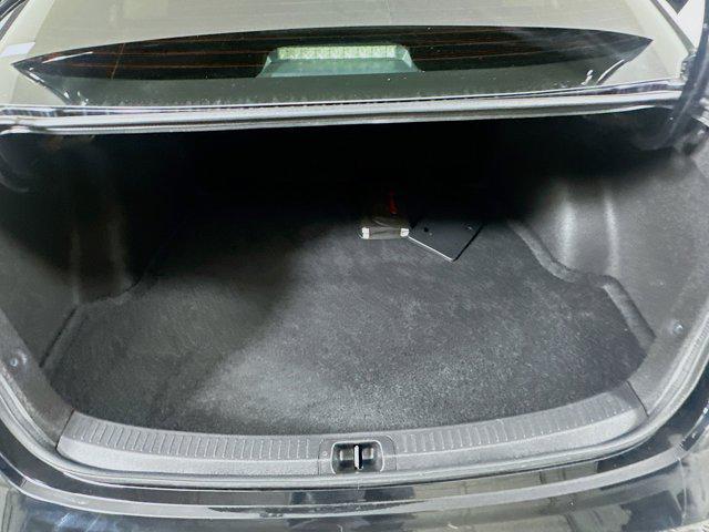 Photo of 2023 Midnight Black Metallic Toyota Corolla